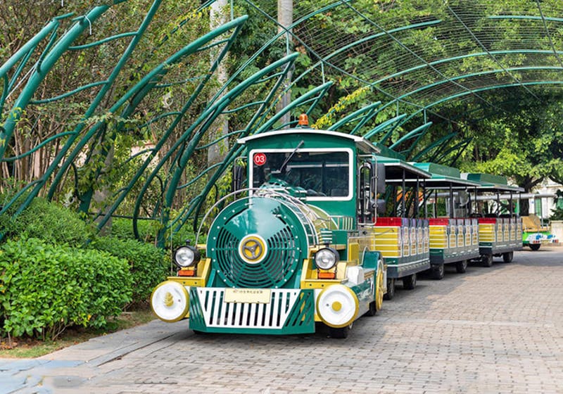 Vintage tourist train operating in heritage park