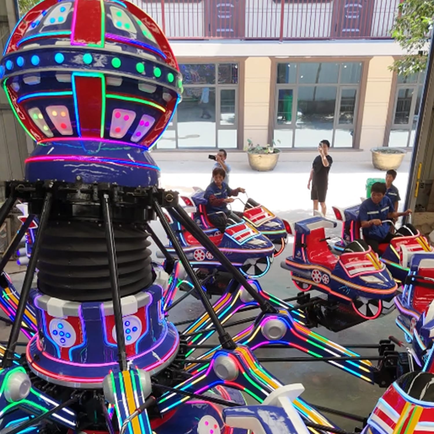 Space Ranger Ride in operation with cosmic lights and special effects