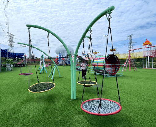 Trident Disk Swing - A swing with trident-shaped disk seats